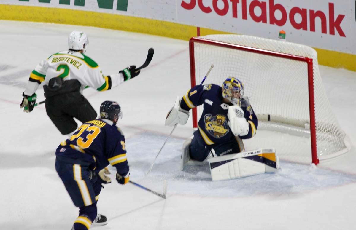 Henry Brzustewicz of the London Knights scores his first goal of the season in a game against the Erie Otters at Canada Life Place on Oct. 10, 2025.