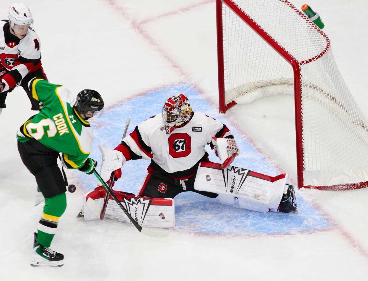 Brody Cook of the London Knights gets a chance in tight in a game between London and the Ottawa 67's on Oct. 31, 2025.