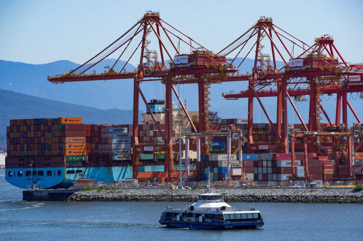 This photo taken at the Port of Vancouver shows cargo containers stacked at the Centerm container terminal, Vancouver, Canada, June 5, 2025..