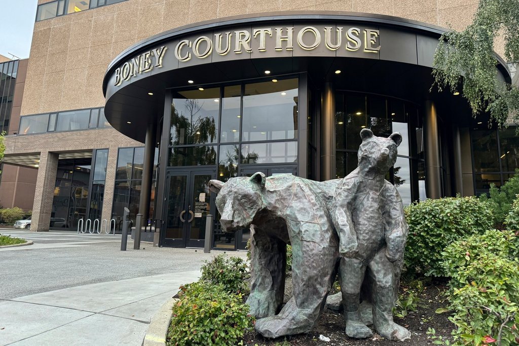 FILE - Bear sculptures sit outside the Boney Courthouse, where the Alaska Supreme Court hears cases, in downtown Anchorage, Alaska, Sept. 10, 2024. (AP Photo/Mark Thiessen, File).