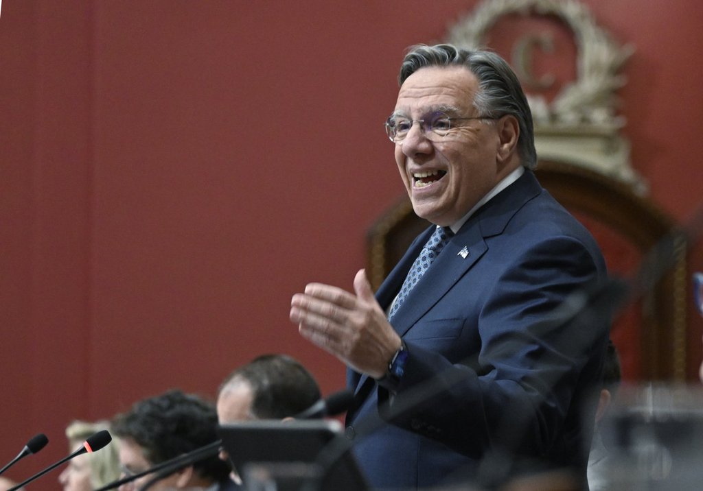 Quebec government adopts secularism bill forcing students to uncover faces