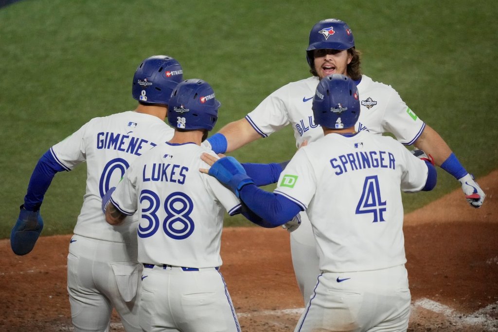 Toronto Blue Jays’ Addison Barger celebrates his grand slam home run against the Los Angeles Dodgers during the sixth inning in Game 1 of baseball’s World Series, Friday, Oct. 24, 2025, in Toronto.