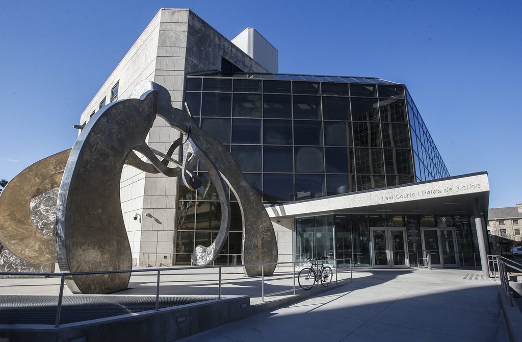 A youth who was 15-years-old when he violently attacked three vulnerable people resulting in their deaths has been handed a life sentence in prison. The Manitoba Law Courts building in Winnipeg on Wednesday, May 8, 2024. 