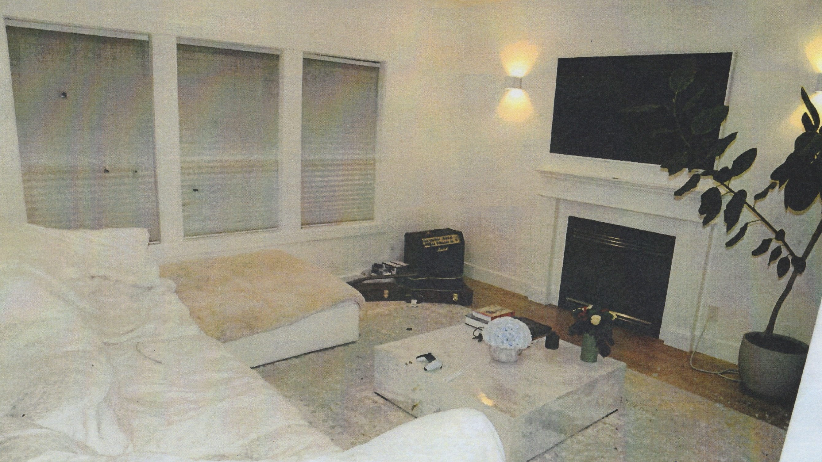 Crime scene photo shows bullet holes in home of Bishnoi target, Colwood, B.C., Sept. 2, 2024.