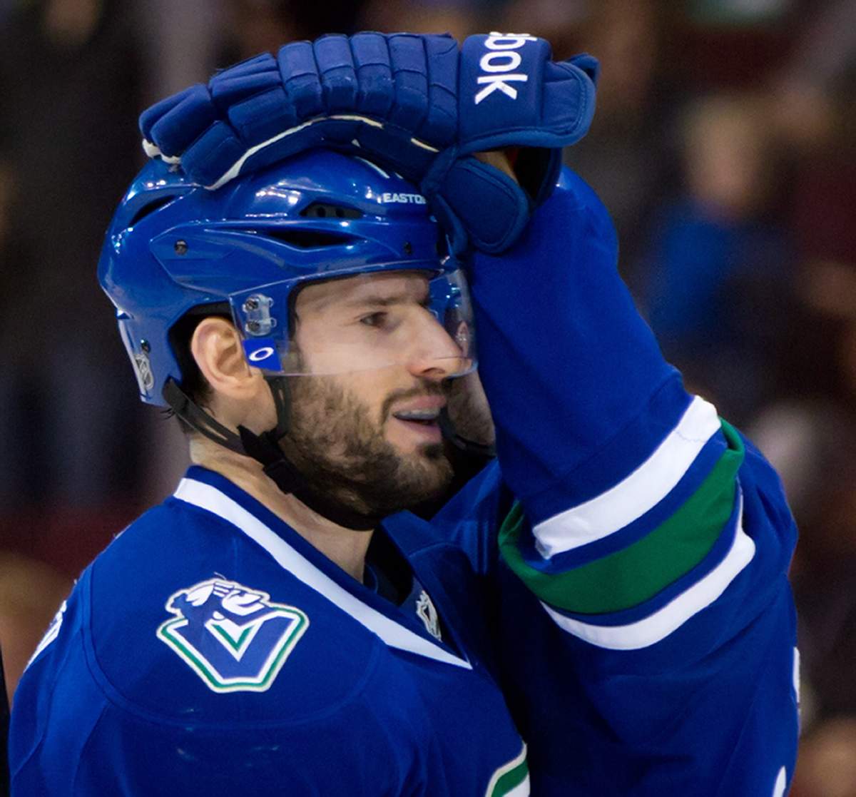 Vancouver Canucks' Ryan Kesler and Ryan Stanton, back, celebrate Kesler's 25th goal of the season, during second period NHL hockey action in Vancouver, B.C., on Sunday April 13, 2014. 