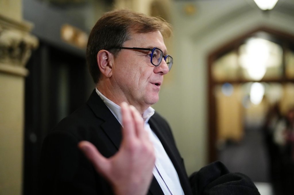 Jonathan Wilkinson speaks with reporters in Ottawa on Monday, March 10, 2025. THE CANADIAN PRESS/Sean Kilpatrick.