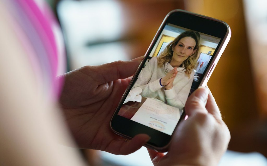 Tanya Myers is seen in a portrait on a phone in Weyburn, Sask., Thursday, Oct. 16, 2025. On Sept. 12, Myers was fatally shot while travelling on Highway 39 near Weyburn. THE CANADIAN PRESS/Heywood Yu.