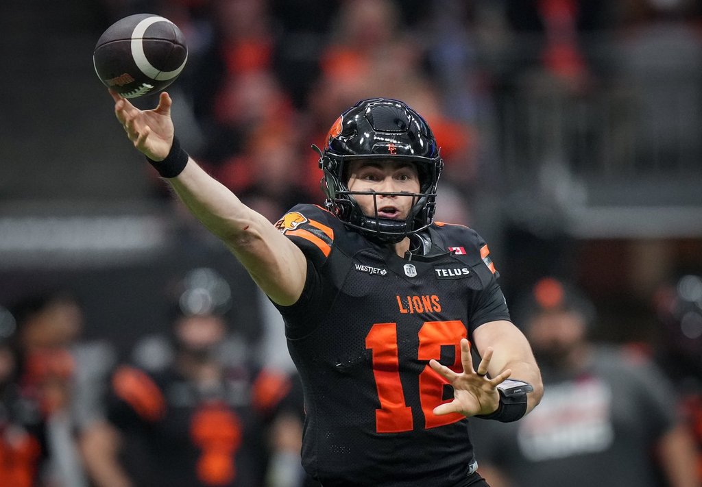 B.C. Lions quarterback Nathan Rourke passes during the second half of the CFL western semifinal football game against the Calgary Stampeders, in Vancouver, on Saturday, November 1, 2025. THE CANADIAN PRESS/Darryl Dyck.