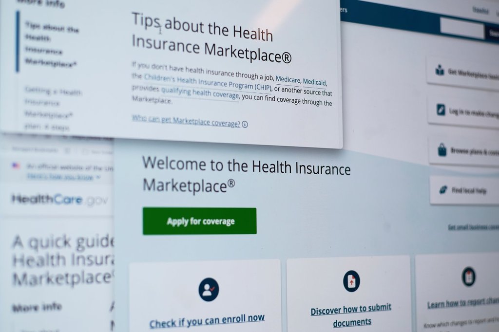 FILE - Pages from the U.S. Affordable Care Act health insurance website healthcare.gov are seen on a computer screen in New York on Tuesday, Aug. 19, 2025. (AP Photo/Patrick Sison, File).