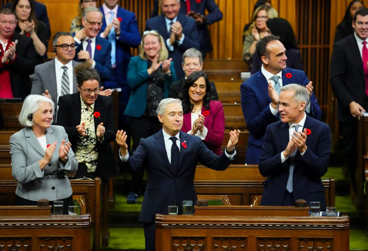 Finance Minister Francois-Philippe Champagne reacts after delivering his budget speech in the House of Commons, in Ottawa, Tuesday, Nov. 4, 2025.