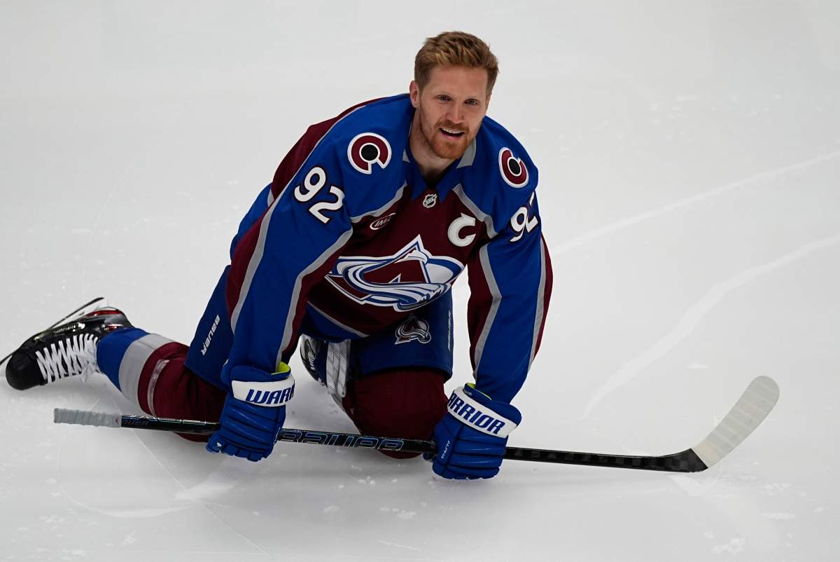 Colorado Avalanche left wing Gabriel Landeskog stretches before the first period of Game 3 of an NHL first-round hockey playoff series against the Dallas Stars Wednesday, April 23, 2025, in Denver. 
