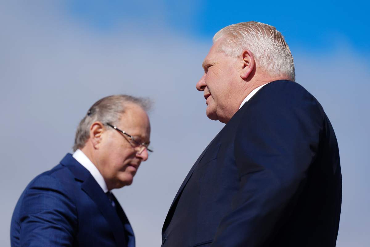Ontario Premier Doug Ford and Solicitor General Michael Kerzner, attend an availability in Mississauga, Ont., on Wednesday, April 30, 2025. 