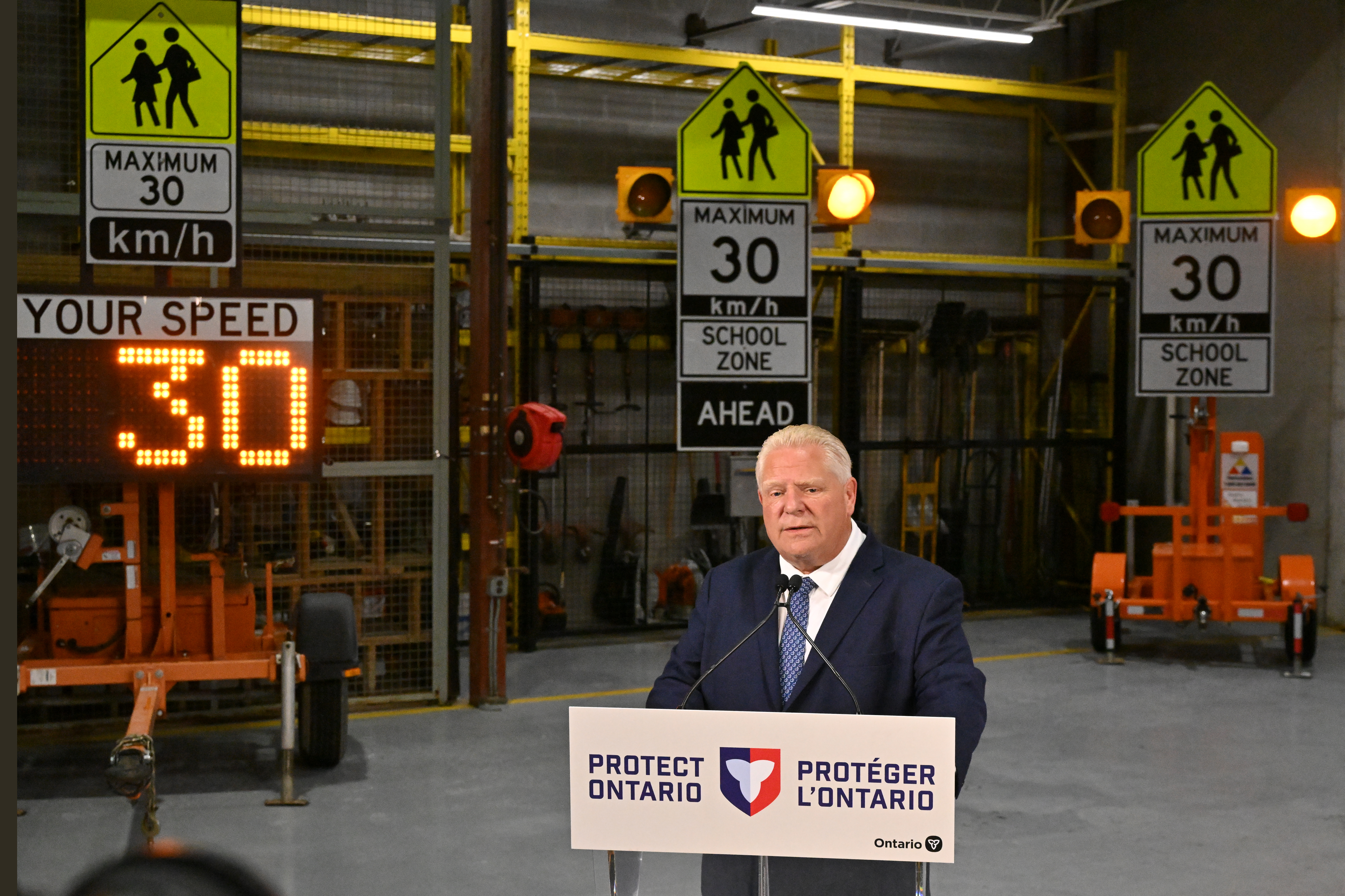 Ford government says it will cover cost of installing oversized school zone signs