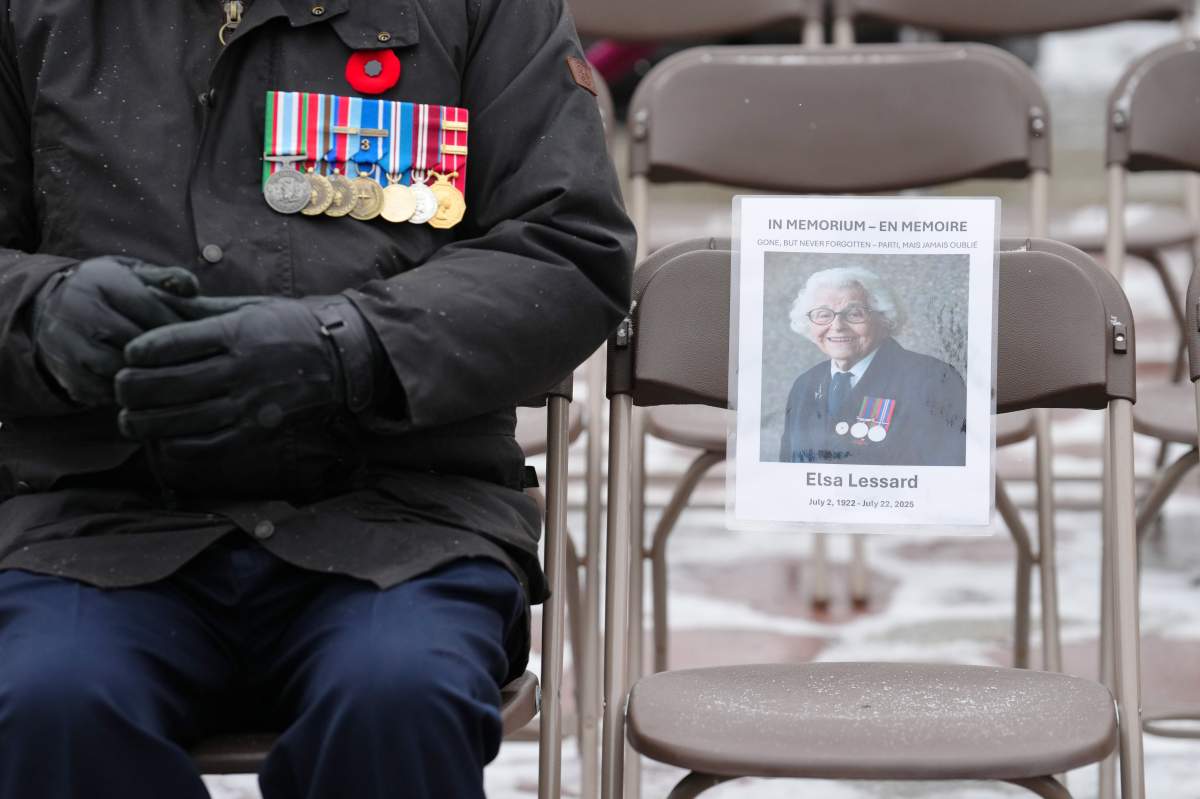 An empty seat in memoriam of Elsa Lessard, a Second World War veteran who died July 22, 2025, is shown at the National War Memorial during a Remembrance Day ceremony in Ottawa on Tuesday, Nov. 11, 2025.