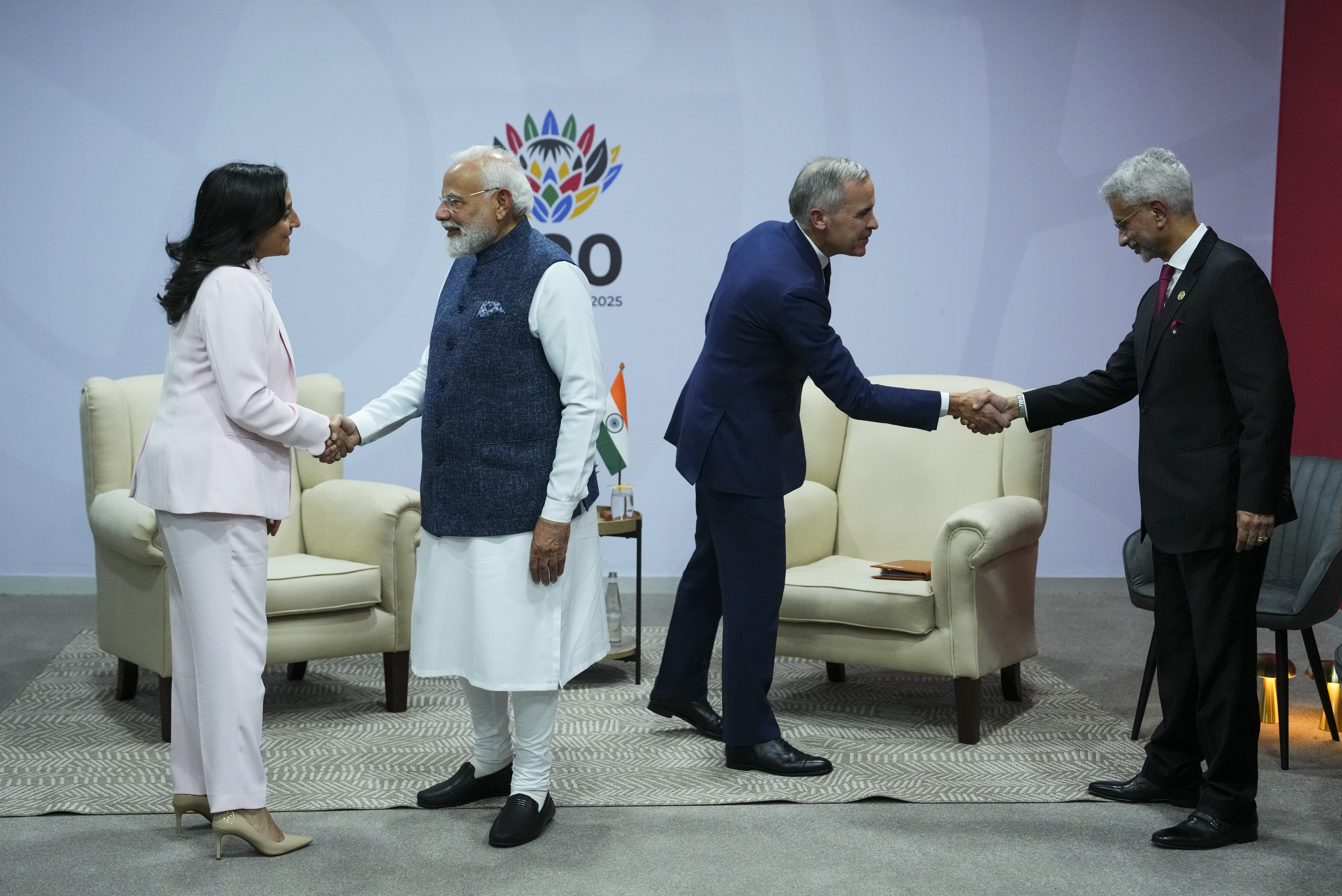 Prime Minister Mark Carney shakes the hand of Indian Foreign Minister Subrahmanyam Jaishankar, right, as Indian Prime Minister Narendra Modi greets Canada’s Foreign Affairs Minister Anita Anand at G20 Summit, Johannesburg, South Africa, Nov. 23, 2025. THE CANADIAN PRESS/Sean Kilpatrick