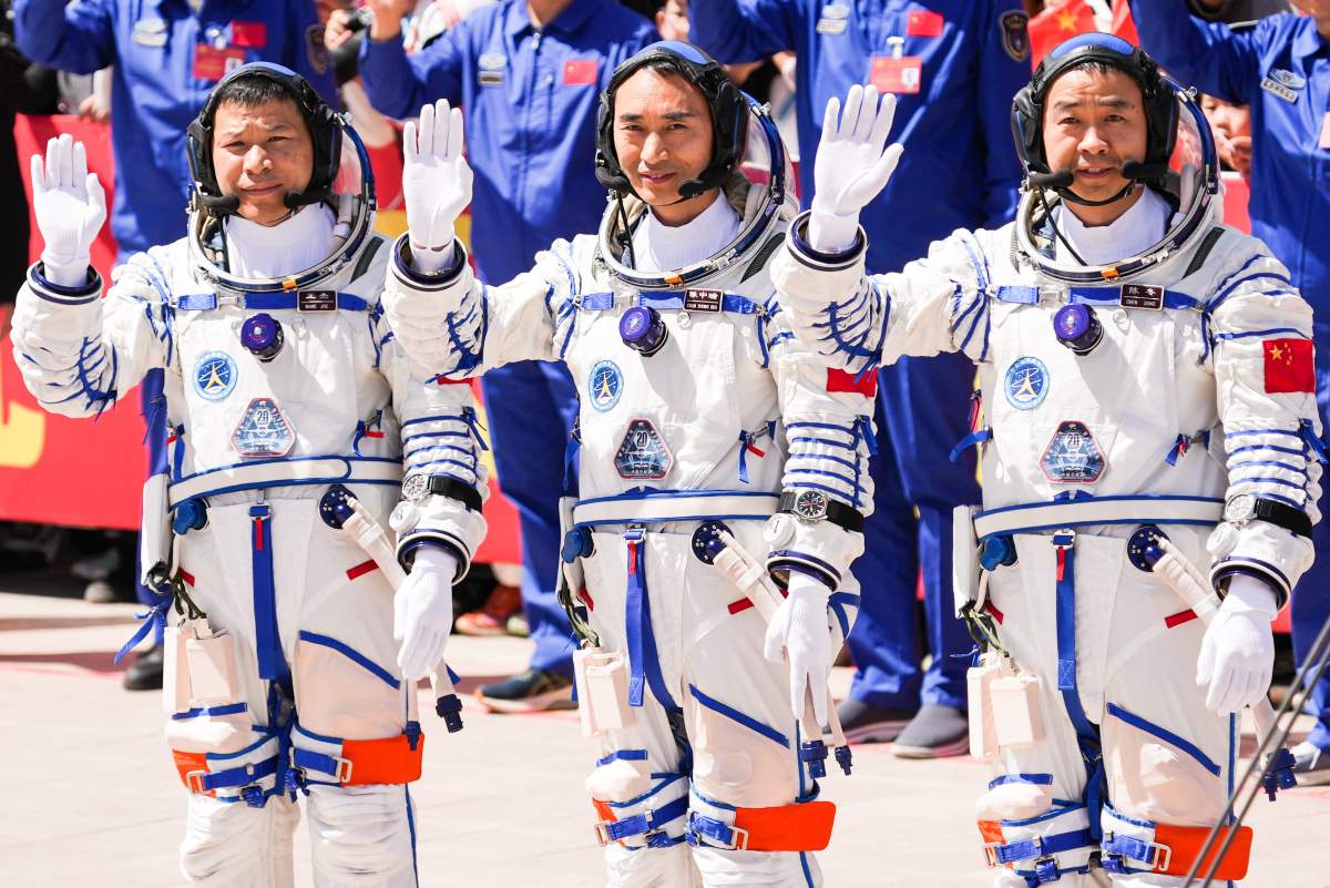 Chinese astronauts Chen Dong (R), Chen Zhongrui (C) and Wang Jie attend a send-off ceremony at the Jiuquan Satellite Launch Center in northwest China on April 24, 2025.