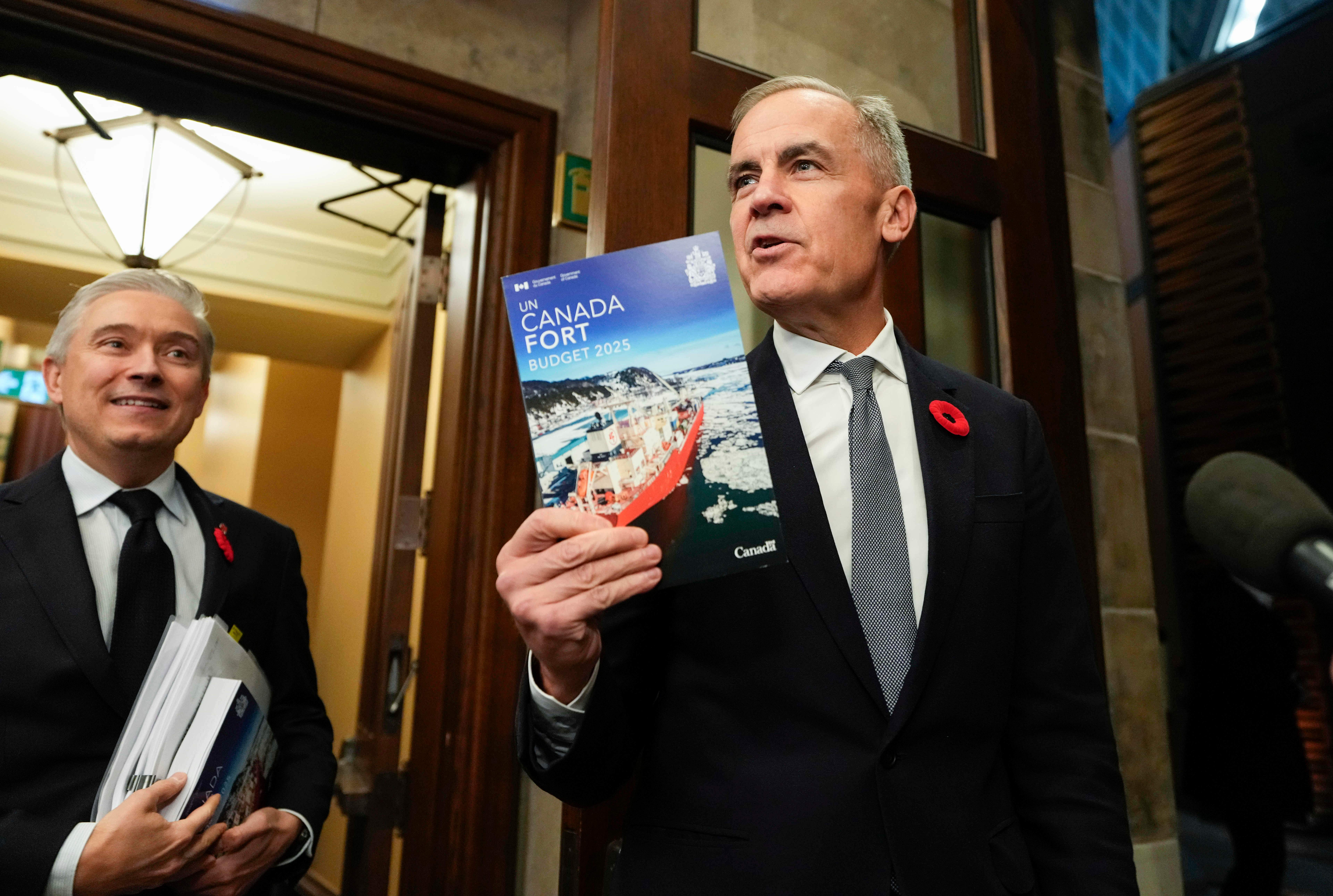 Prime Minister Mark Carney and Minister Francois-Philippe Champagne presenting the federal budget in Ottawa.
