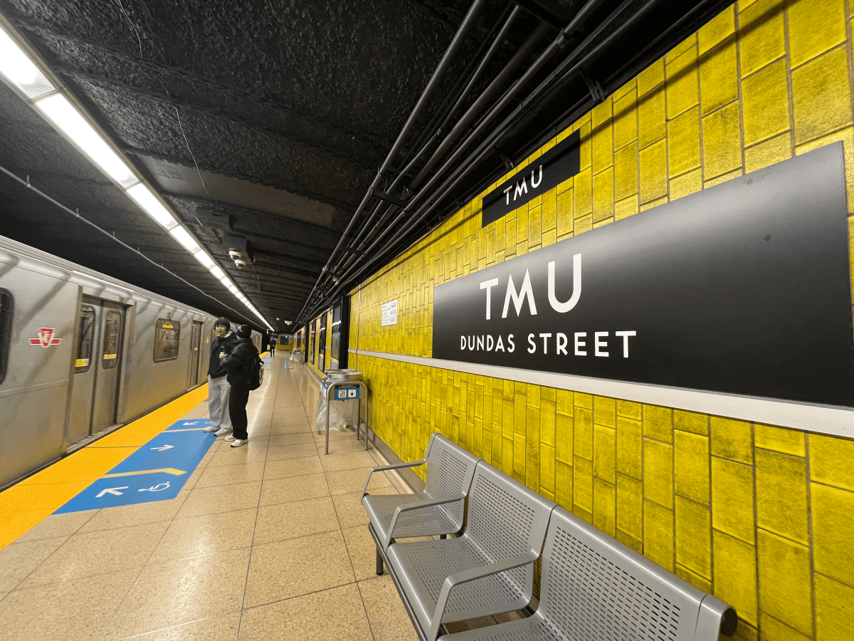 Temporary signage at the renamed TMU Subway Station.