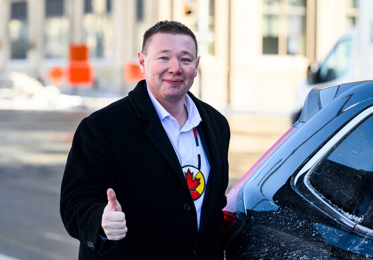 Liberal MP Jaime Battiste, candidate for the leadership of the Liberal Party of Canada, gives a thumbs up as he makes his way to his vehicle in Ottawa, on Friday, Jan. 24, 2025.