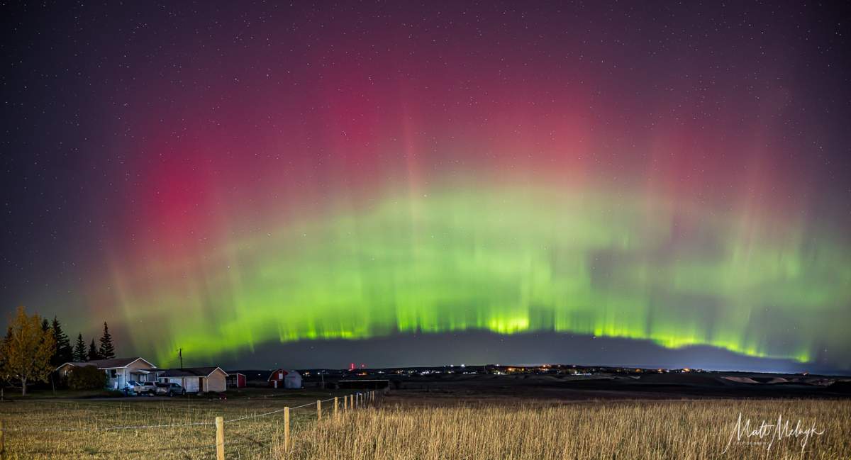 Aurora borealis shines on the horizon