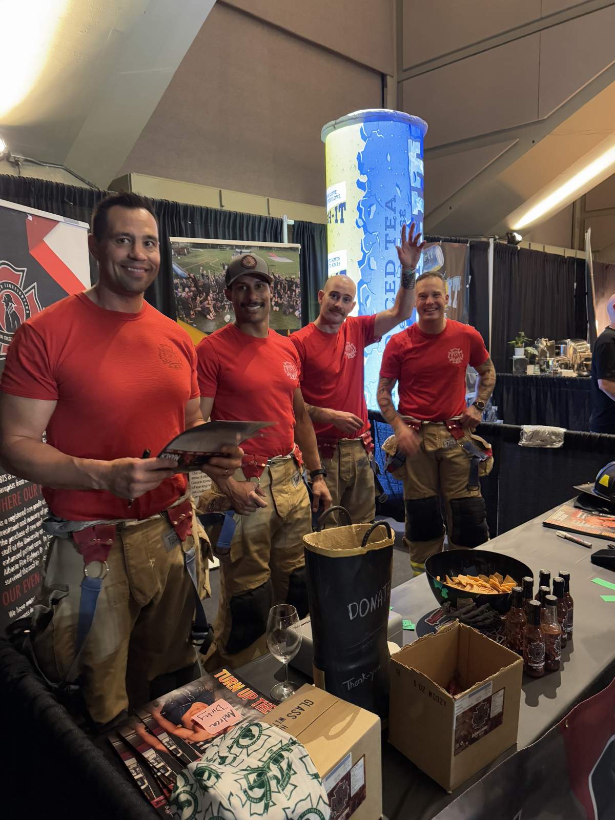Firefighters sign calendars