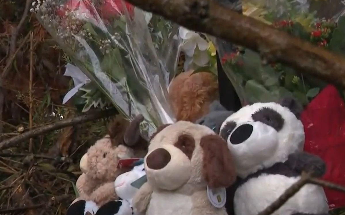 A memorial site has been made for community members to grieve near the crash site where three teens died and a fourth was critically injured.