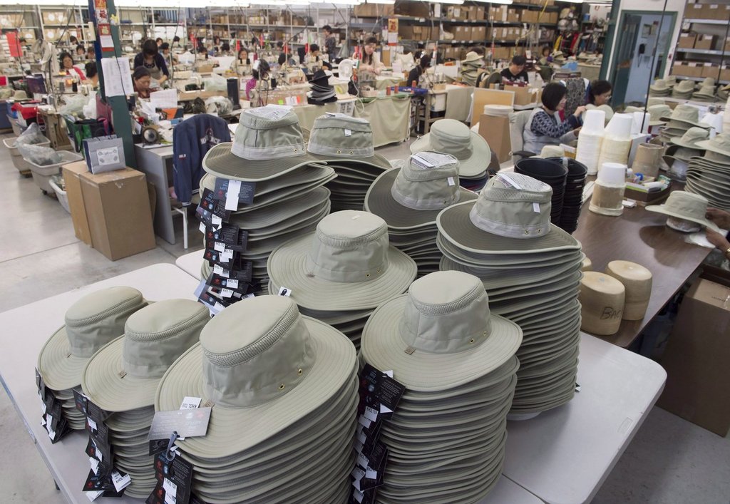 Finished hats sit in piles at the Tilley Endurables factory in Toronto on Thursday January 5, 2017.  THE CANADIAN PRESS/Frank Gunn.