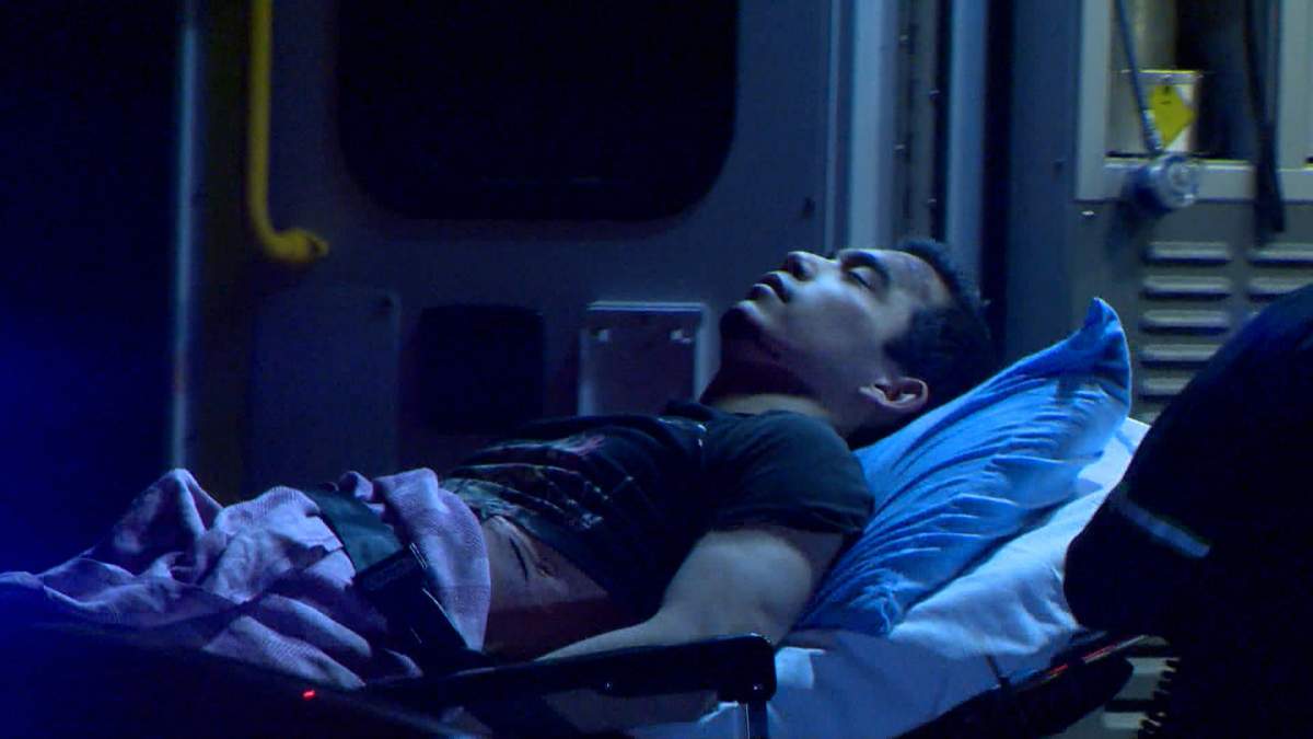 Matthew de Grood, seen here being loaded into an ambulance on April 15, 2014, was found not criminally responsible in the stabbing deaths of five people at a Calgary house party.