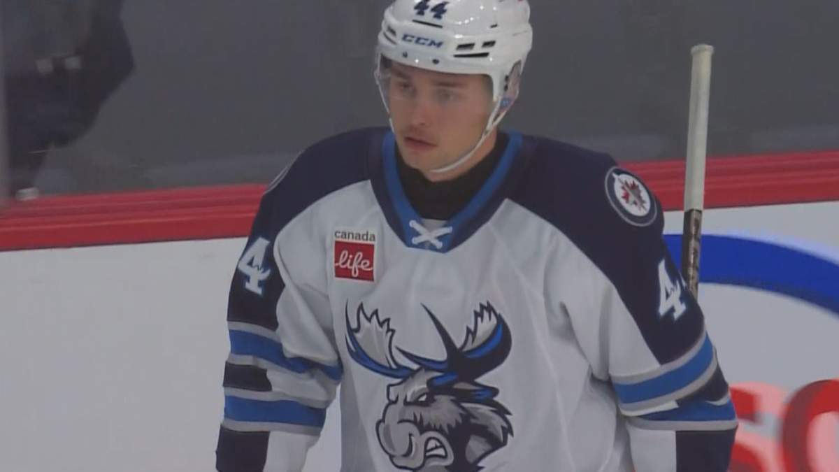 Defenceman Elias Salomonsson skates with the Manitoba Moose,.