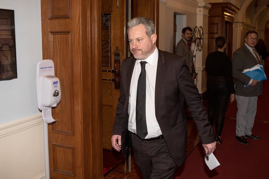 MLA for Surrey-White Rock and BC Conservative interim leader Trevor Halford leaves the house following question period at the B.C. Legislature in Victoria, on Wednesday, Dec. 3, 2025. THE CANADIAN PRESS/Chad Hipolito.