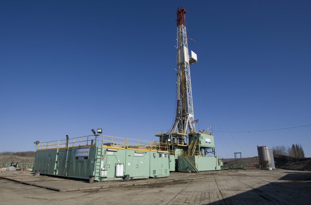 A natural gas drill rig is seen in Toms Lake, B.C., Thursday, April 16, 2009. 