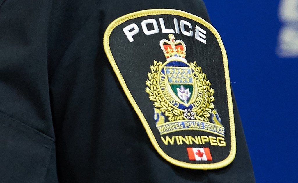 A Winnipeg Police Service shoulder badge is seen on Sept. 2, 2021 at the Public Information Office in Winnipeg. THE CANADIAN PRESS/David Lipnowski.
