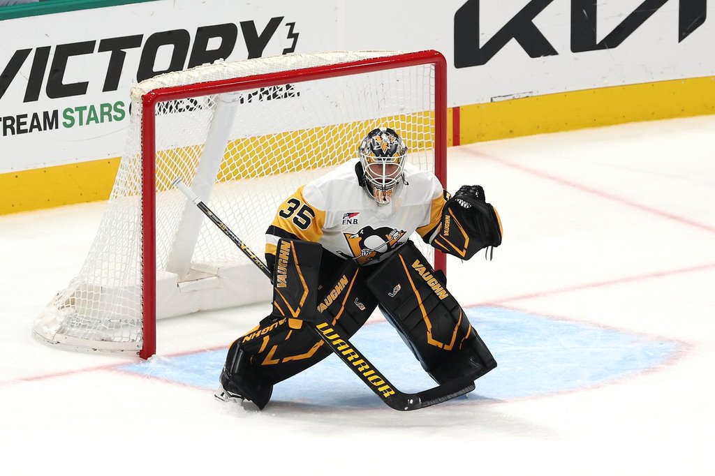 Pittsburgh Penguins goaltender Tristan Jarry defends his net during the third period of an NHL hockey game against the Dallas Stars Sunday, Dec. 7, 2025, in Dallas.