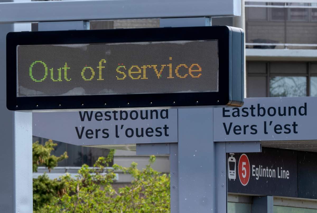 "Out of Service" signs are shown on the Eglinton Crosstown LRT in Toronto on Friday, May 5, 2023.
