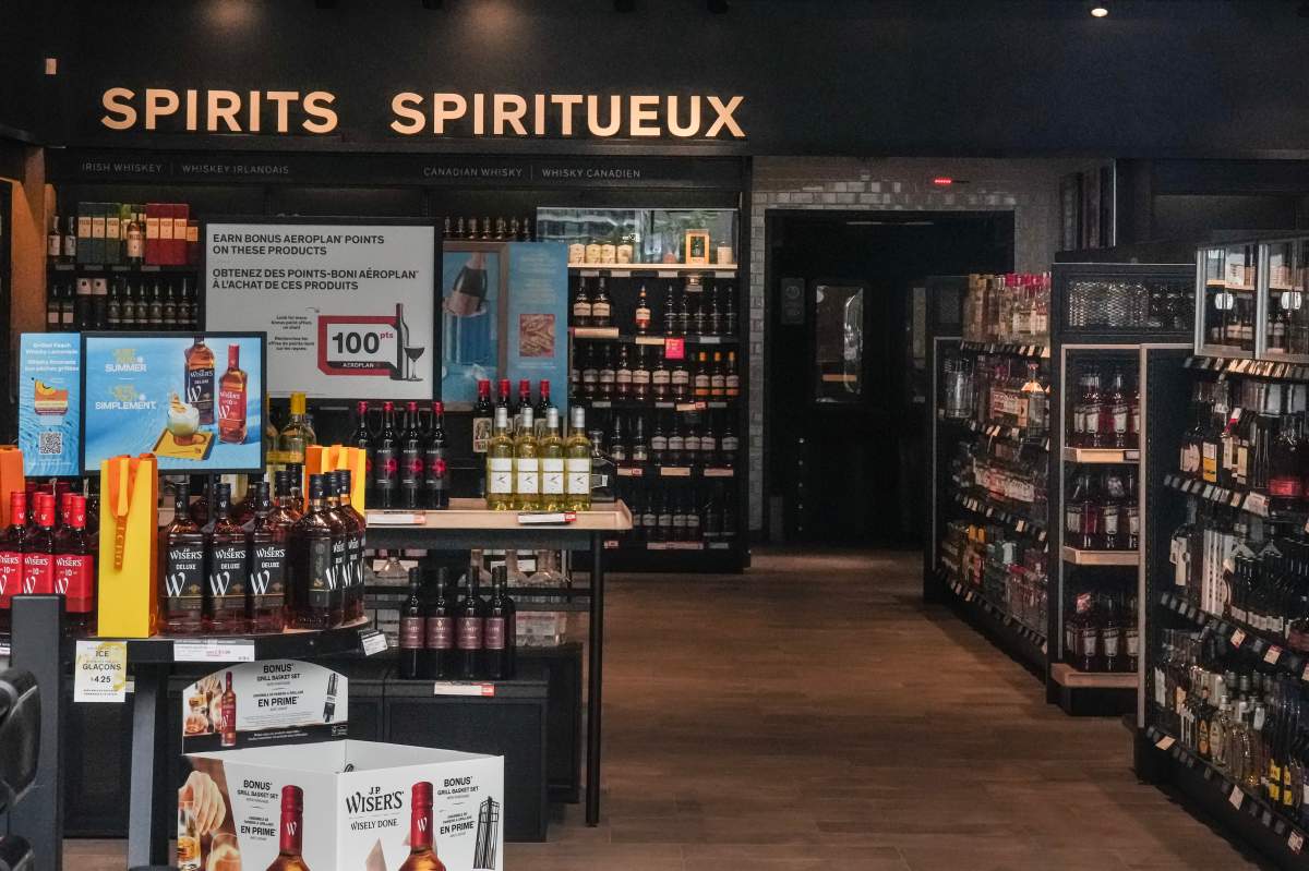 Ontario's main liquor store has begun removing U.S. alcohol from its shelves and website in response to tariffs imposed on Canadian goods by U.S. President Donald Trump.The interior of an LCBO outlet is shown in Toronto on July 15, 2024. 