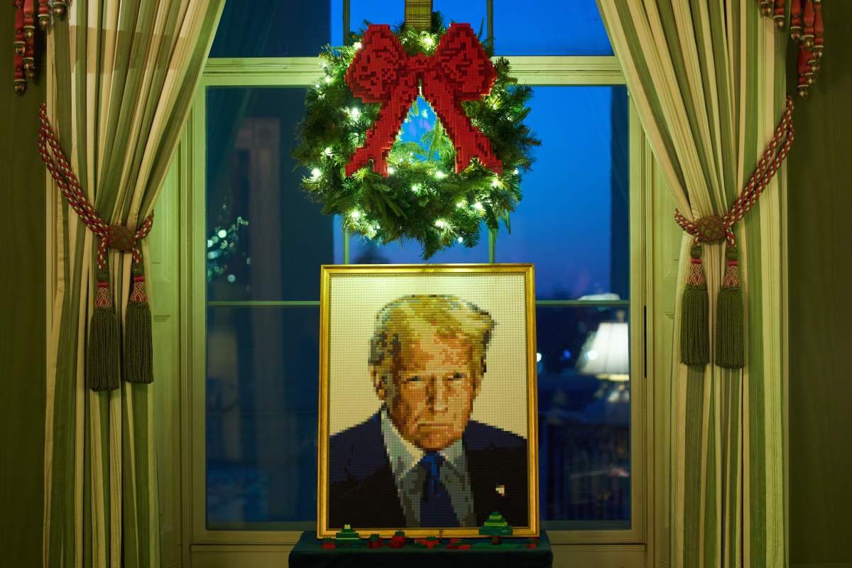 A Lego portrait of President Donald Trump decorates the Green Room of the White House during a press preview of the Christmas decorations 'Home is Where the Heart Is,' Monday, Dec. 1, 2025, in Washington.