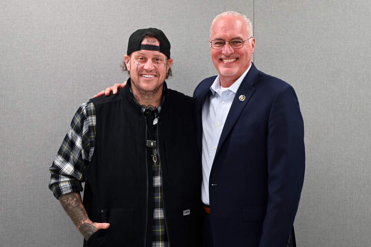 This photo provided by the Nashville-Davidson County Sheriff's Office shows country music star Jelly Roll, left, whose legal name is Jason DeFord, posing for a photo with Davidson County Sheriff Daron Hall at the Davidson County Sheriff’s Office Annex in Nashville, Tenn., Nov. 25, 2025.