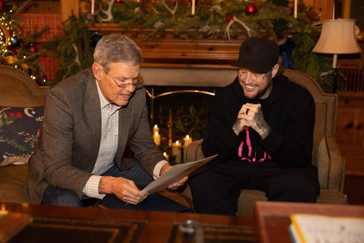 This photo provided by the office of Tennessee Gov. Bill Lee shows Gov. Bill Lee, left, giving country musician Jelly Roll news of his official pardon Thursday, Dec. 18, 2025, at the Tennessee Governor's Mansion in Oak Hill, Tenn.
