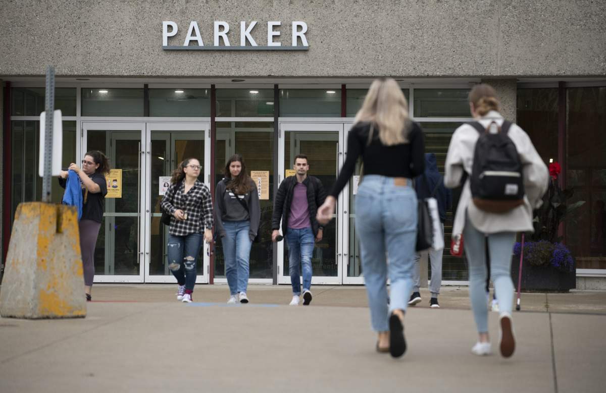 Students heading to class at the R.D. Parker Building at Laurentian University in Sudbury, Ont., are photographed on Sept. 12, 2022.