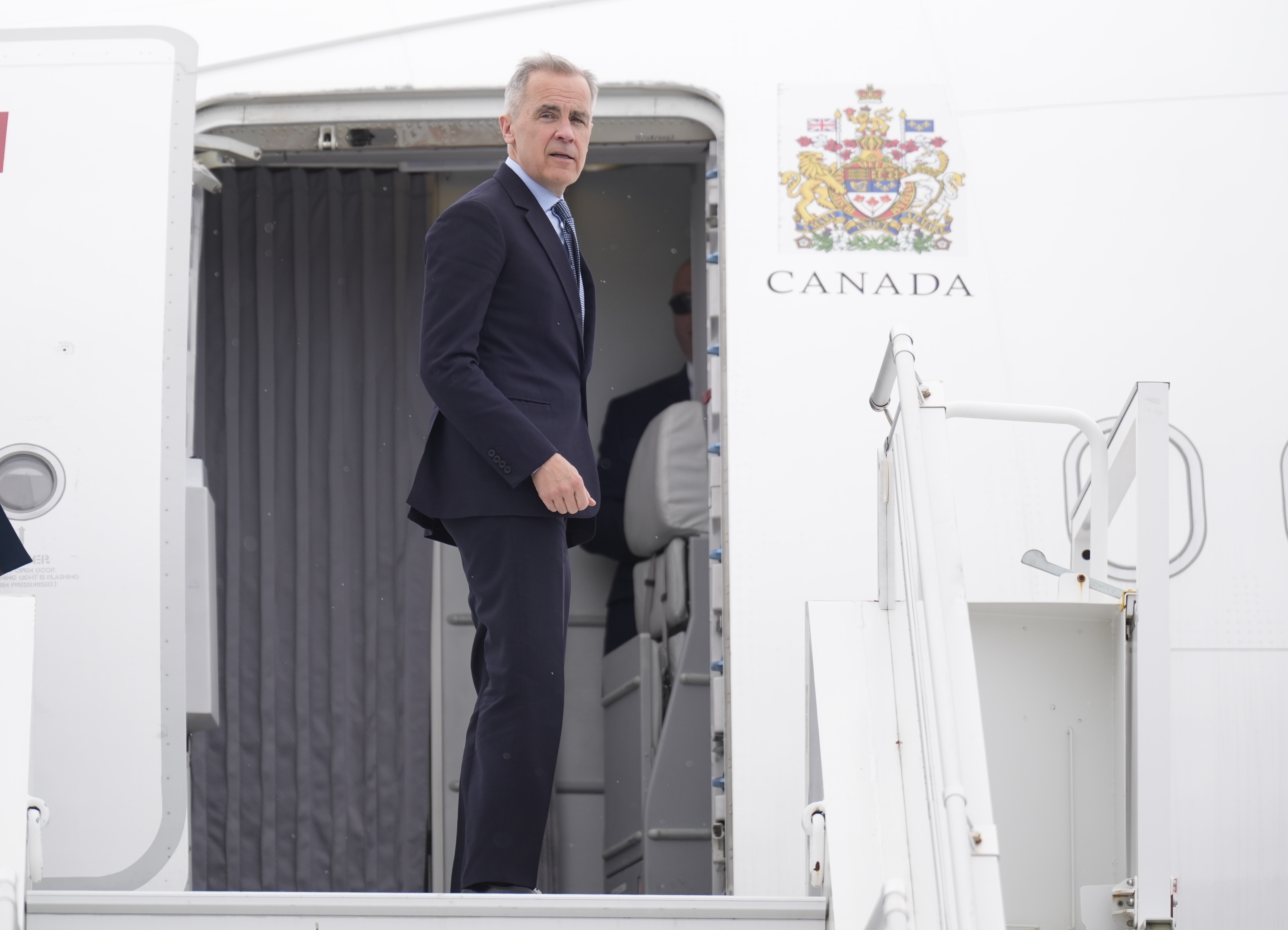 Министър председателят Марк Карни президентът на САЩ Доналд Тръмп и президентът