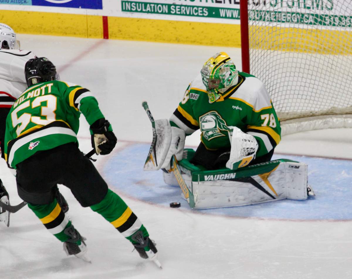 Aleksei Medvedev of the London Knights makes a third period save on Tristan Delisle of the Owen Sound Attack in a game played on Dec. 17 at the Harry Lumley Bayshore Community Centre.