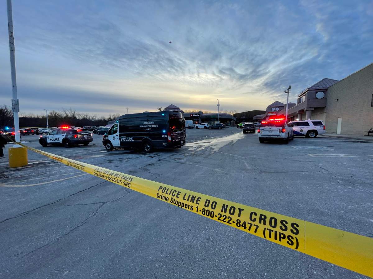 Toronto police vehicles are seen in the area of Finch Avenue West and Dufferin Street on Dec. 24, 2025.