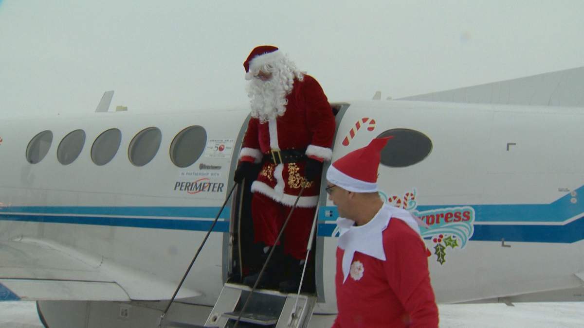 Santa arriving in O-Pipon-Na-Piwin Cree Nation. 
