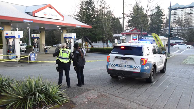 Police officers at the scene where a woman was struck and killed by a Surrey Police vehicle on Thursday, Dec. 25th.