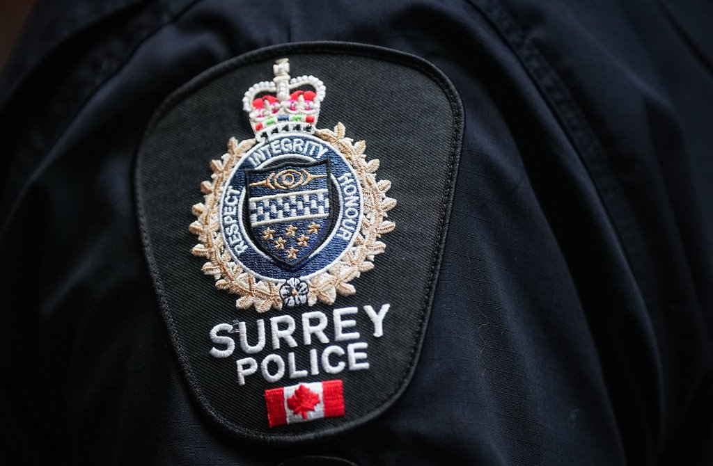 A Surrey Police Service patch is seen on an officer's uniform in Surrey, B.C., on Friday, Nov. 29, 2024. THE CANADIAN PRESS/Darryl Dyck.