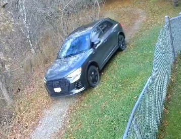The grey Audi SUV that police say bypassed parade barricades by driving through a pedestrian pathway.