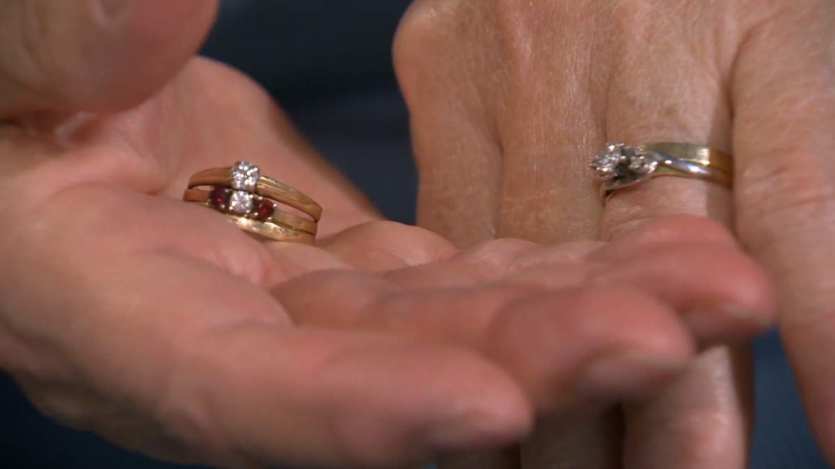 After Janet's original engagement ring (on the right) disappeared, Robert replaced it with a new ring (on the left).
