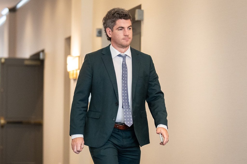 Coquitlam RCMP constable Ian Solven returns to an RCMP code of conduct hearing in Richmond, B.C., on Wednesday, Sept. 17, 2025. THE CANADIAN PRESS/Ethan Cairns.