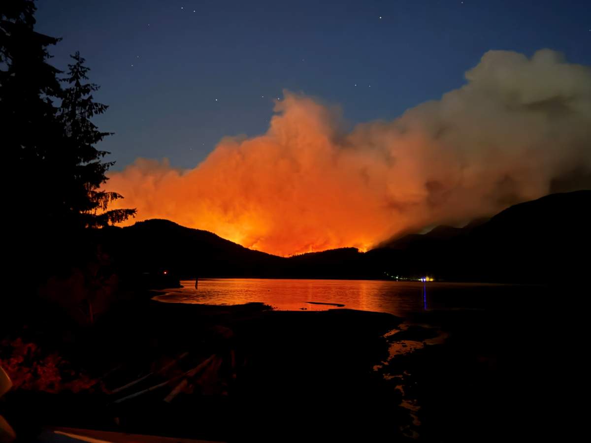 A wildfire is seen burning about 16 kilometres south of Port Alberni, B.C.,