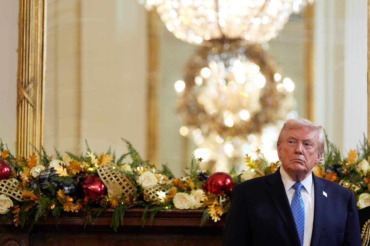 President Donald Trump listens during a reception in the East Room of the White House, Tuesday, Dec. 16, 2025, in Washington.